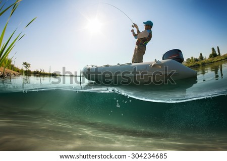 Similar – Image, Stock Photo Underwater view of man free diving in blue ocean.