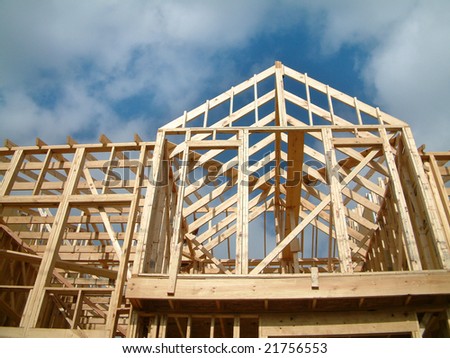 New home construction with wooden house frame