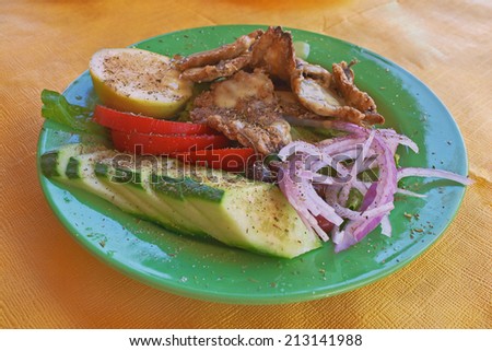 appetizer fried sardines with vegetables, Greek food, Corfu