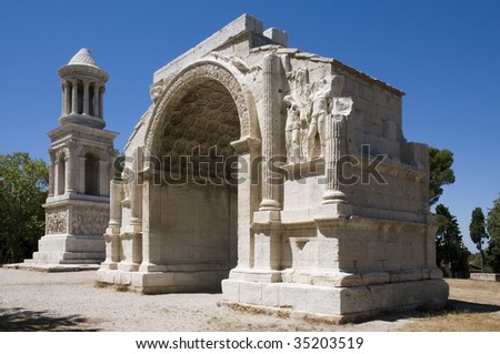 Glanum, Saint-Remy-de-Provence:  Triumphal arch and Cenotaph. Glanum, Roman city situated south of Saint-Remy-de-Provence, possesses an impressive triumphal arch. Close nearby is a intact cenotaph.