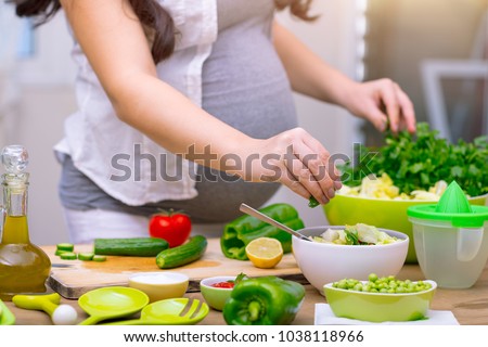 Similar – Image, Stock Photo Nutrition during pregnancy