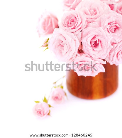 Picture of great rose bouquet in wooden pot isolated on white background, pink bridal bunch in vase in studio, romantic holiday gift, wedding day, mothers day, spring season, romance and love concept