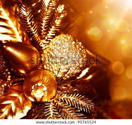 Golden Christmas tree decoration, winter holidays ornament, festive border, gold background with magic glow lights