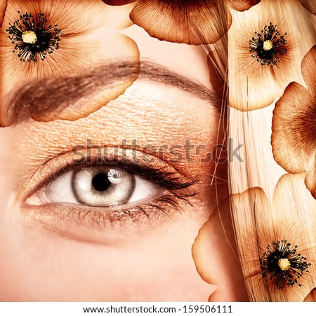 Stylish autumn makeup, beautiful flowers decoration on blond hair, face part, glossy golden eyeshadow, fashion and beauty concept