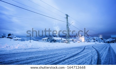 Picture of village covered with snow, beautiful New Year greeting card, snowy road in countryside, luxury villa on ski resort, snowfall in winter, wintertime holidays, cold weather