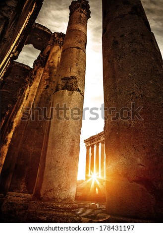 Baalbeck ruins in bright orange sunset, aged roman architecture, antique castle, world famous landmark, old religious temple in Lebanon