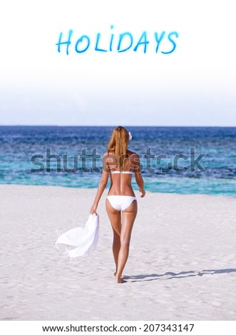 Summer holidays on the beach, beautiful woman enjoying walking, sexy female wearing white bikini, fit healthy woman on vacation getaway, hot girl travels