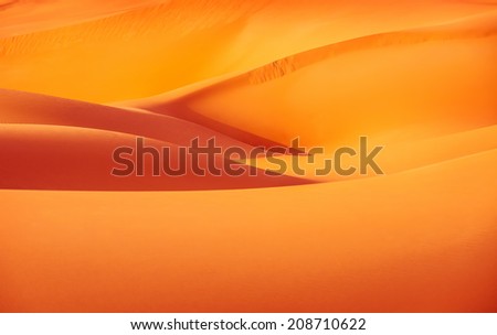 Abstract orange sandy desert background, wilderness of United Arab Emirates, scenes destination, travel and tourism concept