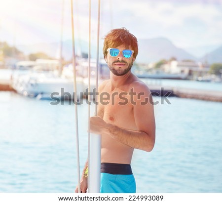 Handsome man on yacht, guy enjoying sea cruise on luxury sailboat, summertime activity, travel and tourism concept