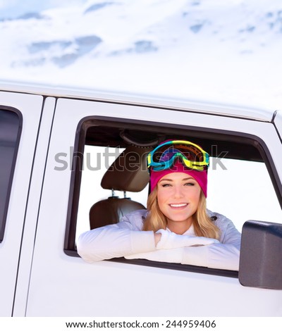 Portrait of cute happy woman in the car going to the ski resort, active lifestyle, enjoying winter vacation concept