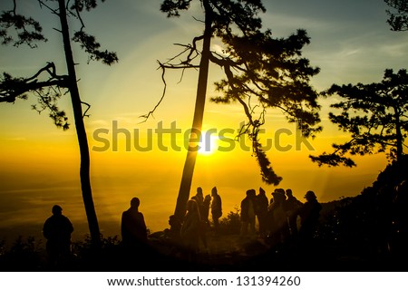 Sunrise at the mountain view with a group of people