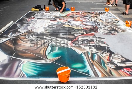 SYDNEY-OCOBER 31 : Street artist painting on the floor at Sydney ,Australia on October 31,2011 .Street artist was performed around the city.