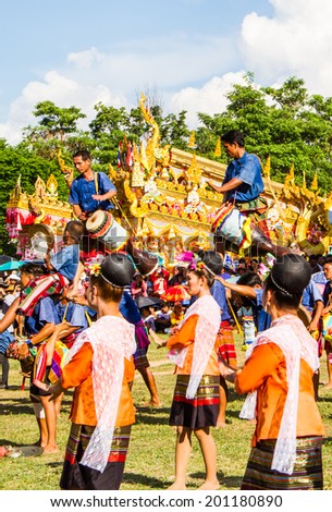 MAHASARAKHAM,THAILAND - MAY 18 : Thai group performing Thai music and Thai dancing in Rocket festival  parade  on May 18,2014 .This festival for agriculture  to celebration the raining season.