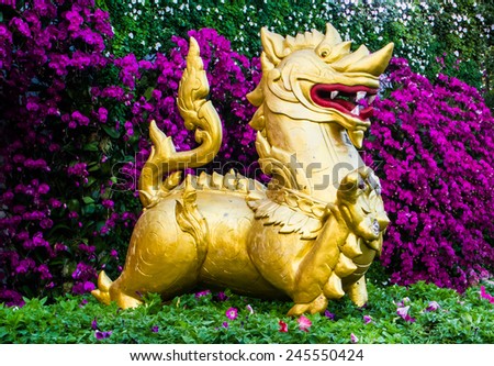 CHIANG RAI,THAILAND-JANUARY 4 : Golden lion in Chiang rai flower festival on January 4,2015.This event will happen in winter time every year.