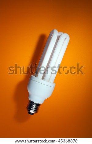 fluorescent light bulb on color background