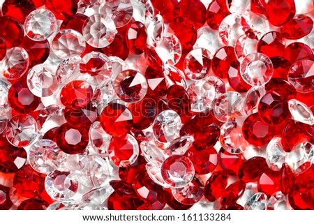 top view of transparent and red glass stones