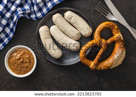 Similar – Image, Stock Photo German white sausage in ceramic bowl. Bavarian veal sausage. Traditional food