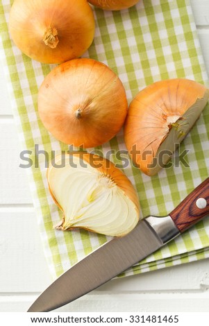 halved fresh onion on a kitchen table