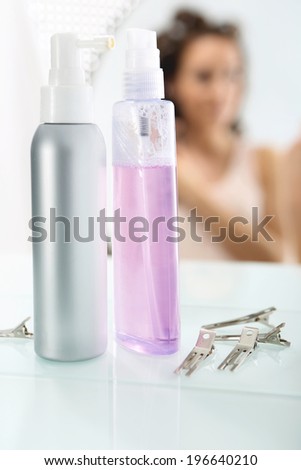 Cosmetics for hair styling , cosmetic composition set on bathroom shelf