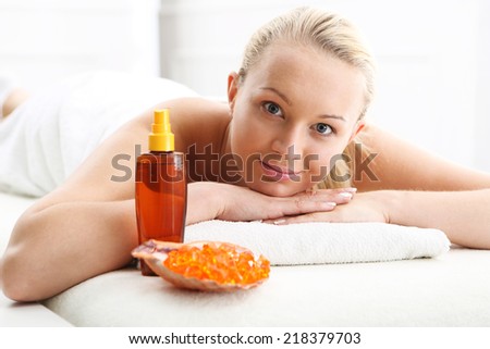 Massage olive. Woman on the back massage.Attractive blonde woman in the office spa, relaxes August waiting for a cosmetic procedure.