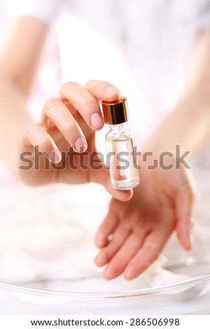 Natural oil for nail care.The bottle with the preparation for the care of cuticles and nails