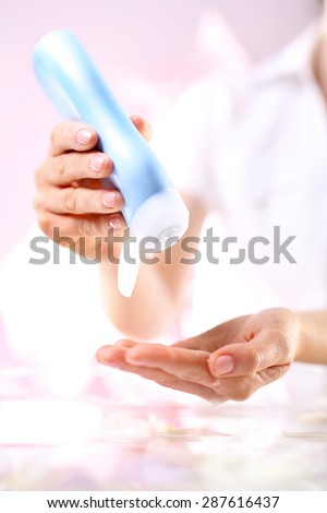 Massage oil, massage. The woman in the spa salon for a massage hand