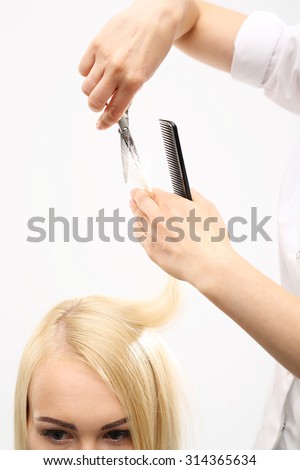 Barber haircut woman in a hair salon