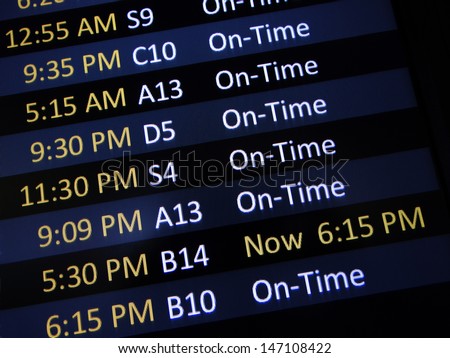 Airport signage alerting passengers of a delay