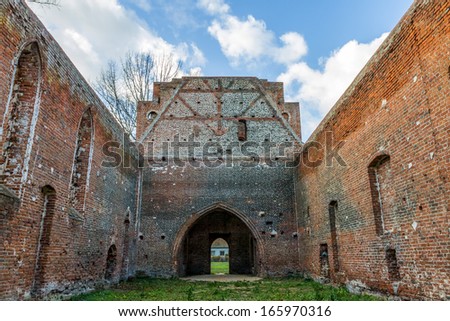 Gothic ruins of the Church, destroyed by fire, located on Zulawy, Poland