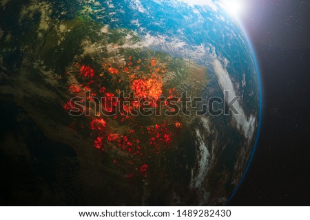 Aerial view from space of ecological disaster of fires in the Amazon, South America