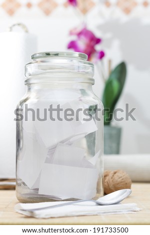 Dreams written on white paper in glass jar