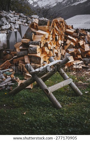 Firewood with mountains in the background