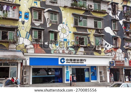 CHONGQING, CHINA - SEPTEMBER2,2014: Huangjueping Graffiti Street in Chongqing, China on September2,2014.Huangjueping Graffiti Street is the largest graffiti street in China and the world.