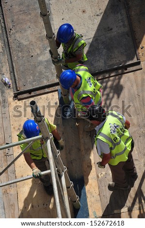 Workers on construction site/London/Construction site