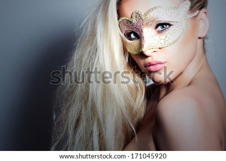 Beautiful Blond Woman in Carnival Mask.Masquerade. Sexy Girl. Your Text Here