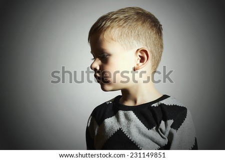 Fashionable child in sweater. fashion kids.children.little boy.profile