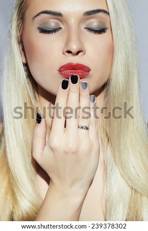 Beautiful Face of blond Woman with Manicure. Sexy Beauty Girl. Nail design. Make-up. Beauty salon