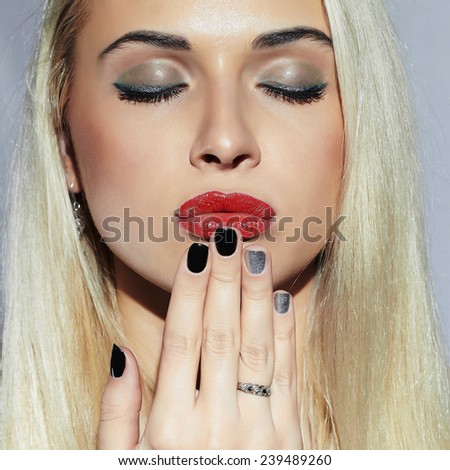 Beautiful blond Woman with Manicure. Sexy Beauty Girl. Nail design. Make-up. Beauty salon.close-up face