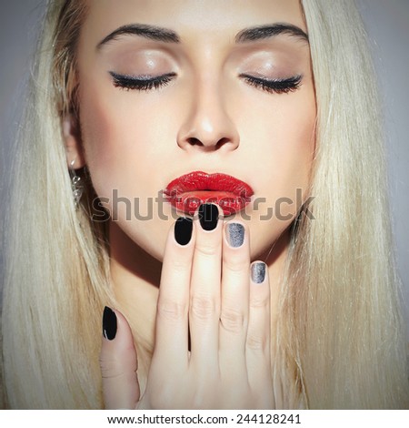 make-up face.Beautiful blond young Woman. Sexy Beauty Girl with red lips.Beauty salon. Shellac manicure