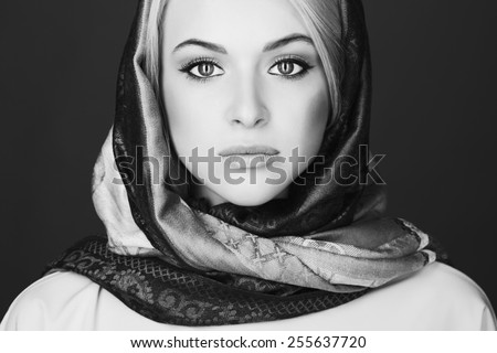 monochrome portrait of Beautiful blond woman in scarf.winter fashion.Beauty Girl.old Russian style.Slavic appearance