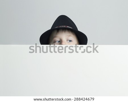 little boy in hat.funny child.your text here