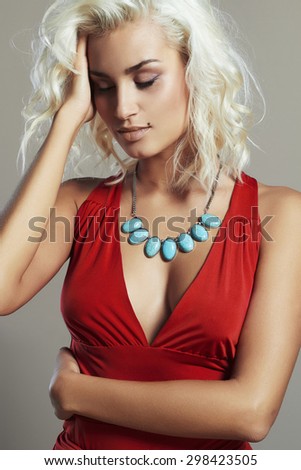 young beautiful woman in red dress.Sexy Blond girl.perfect body