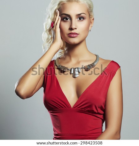 young beautiful woman in red dress.Sexy Blond girl.perfect body