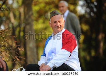 Belgrade, Serbia - October 26, 2013: Man with T-shirt Yogoslavia at the funeral of Jovanka Broz. Jovanka Broz, Yugoslavia\'s former First Lady built by her husband Josip Broz Tito in the House of Flowers mausoleum.