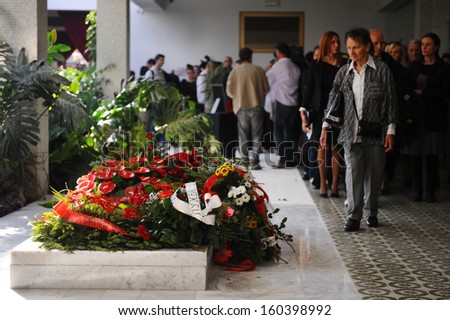 Belgrade, Serbia - October 26, 2013: People passing by the grave of Jovanka. Jovanka Broz, Yugoslavia\'s former First Lady built by her husband Josip Broz Tito in the House of Flowers mausoleum.