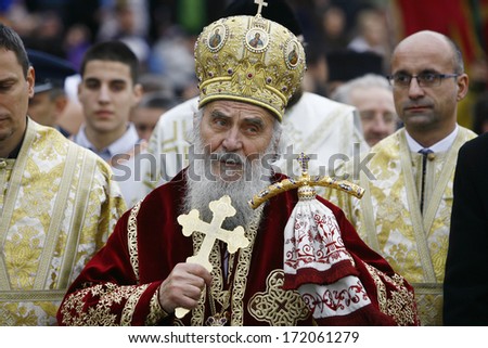 ZEMUN, SERBIA - JAN 19, 2014: Serbian Patriarch Irinej at the column. The Serbian Orthodox Church, traditionally Epiphany with competitions to retrieve the Holy Cross from Danube river in Zemun.