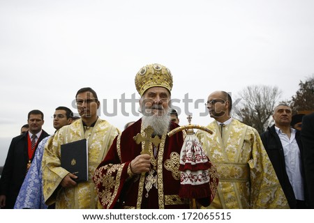ZEMUN, SERBIA - JAN 19, 2014: Serbian Patriarch Irinej at the column. The Serbian Orthodox Church, traditionally Epiphany with competitions to retrieve the Holy Cross from Danube river in Zemun.
