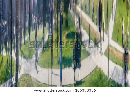 Abstract Twisted Metal Mirror in nature and man reflection
