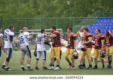 Belgrade, Serbia - May 05, 2014: Teams are welcome among themselves. American Football Match Between Belgrade Wolves And Blue Dragon in Belgrade. The Wolves team is winner.