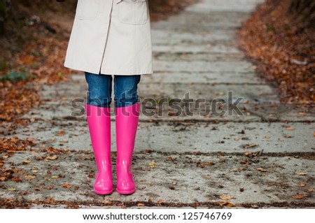 Woman wearing rubber boots